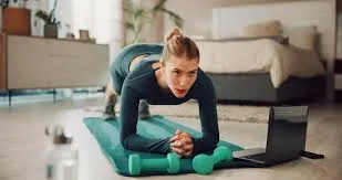 Person seated stretching before standing